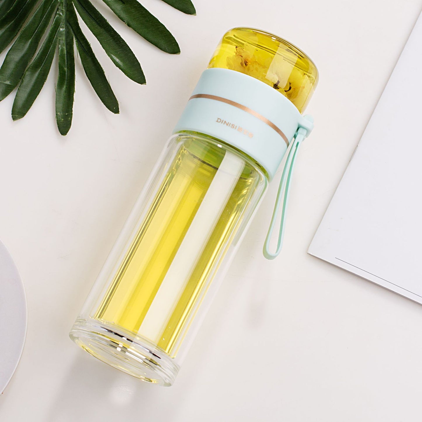 Phantom Pour glass portable bottle with tea or herbal infusion